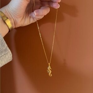 Gold seahorse pendant necklace